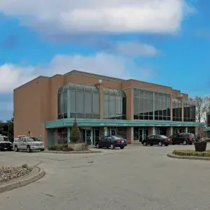 1315 Lawrence building exterior showing parking area