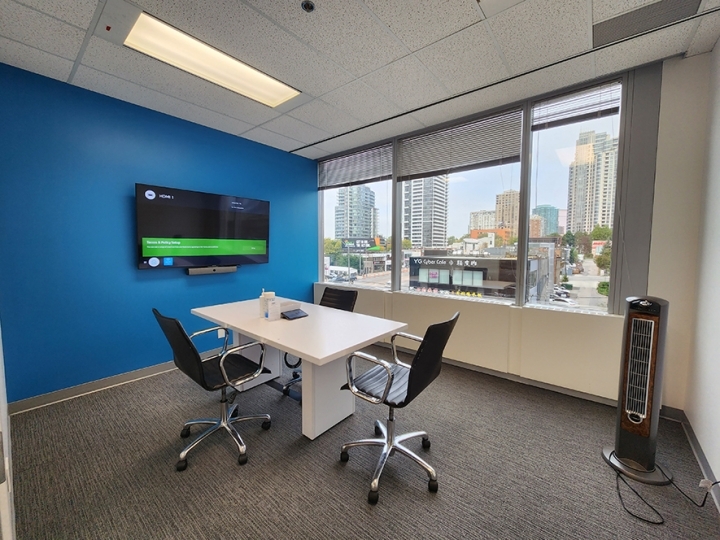 5255 Yonge Street corner suite office with TV mounted on the wall