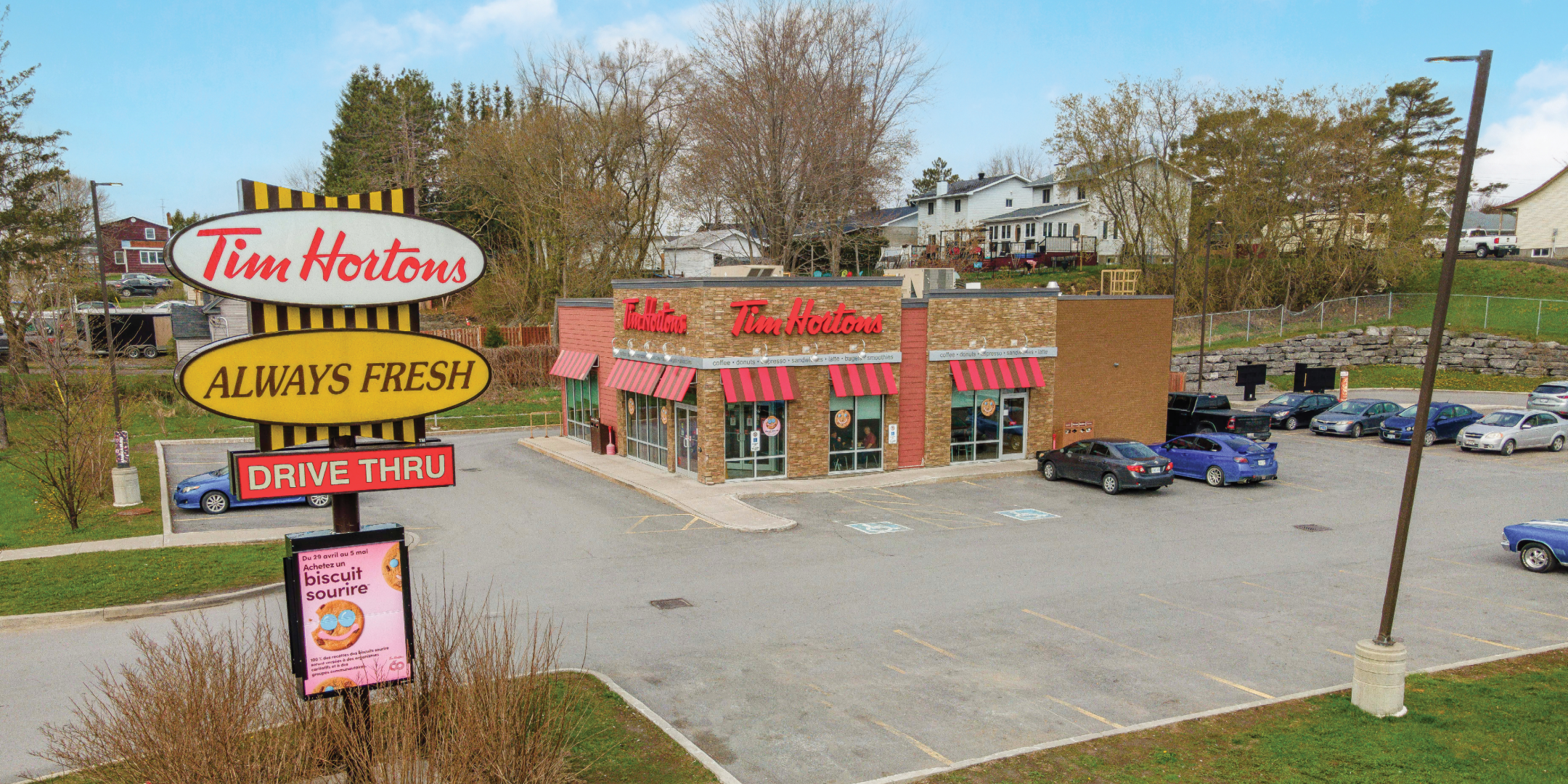 108 St. Philippe Street Tim Hortons Front with large sign and parking lot