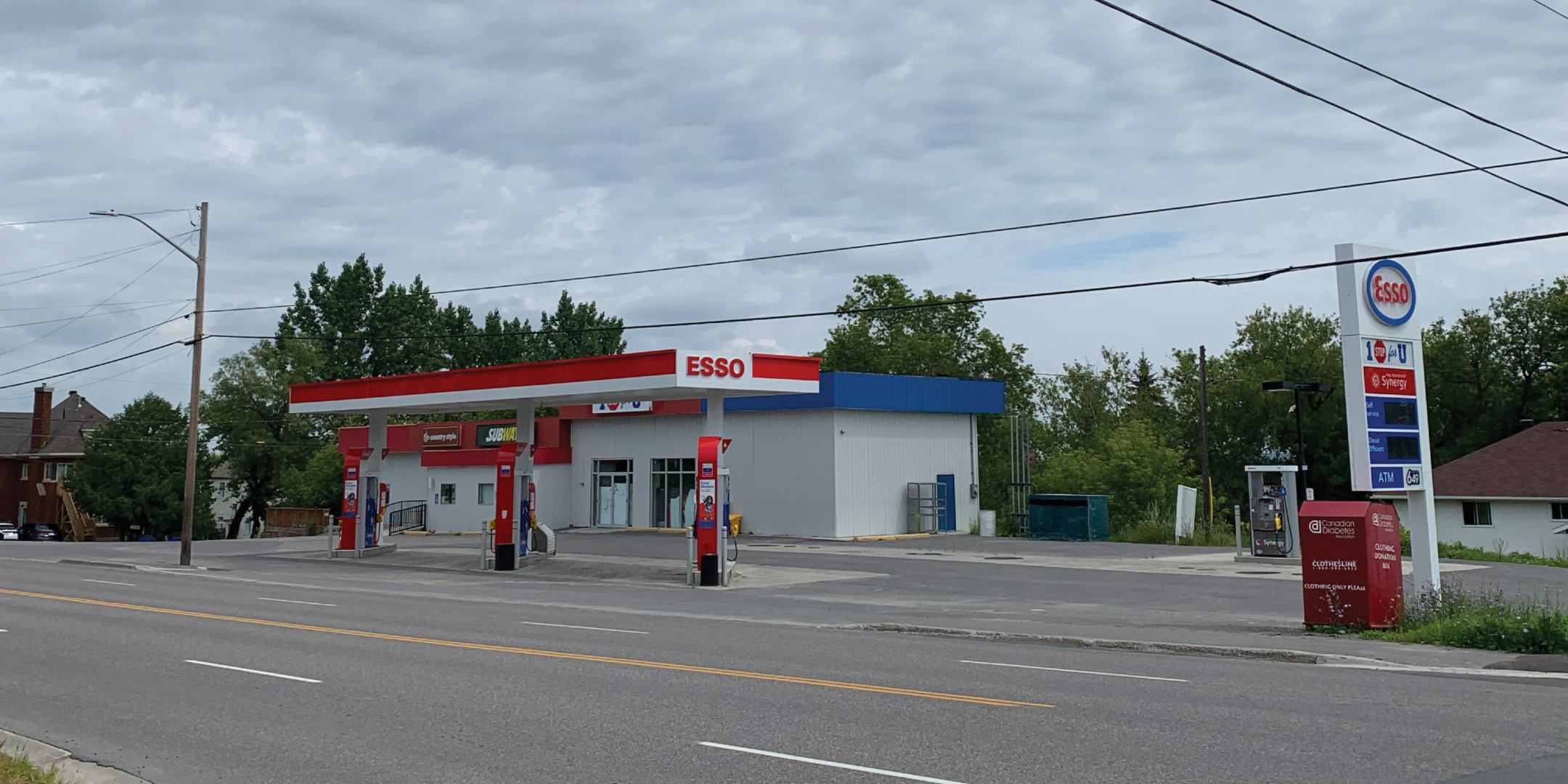 219 Rorke Avenue Exterior Storefront, Main Entrance, and Gas Pumps