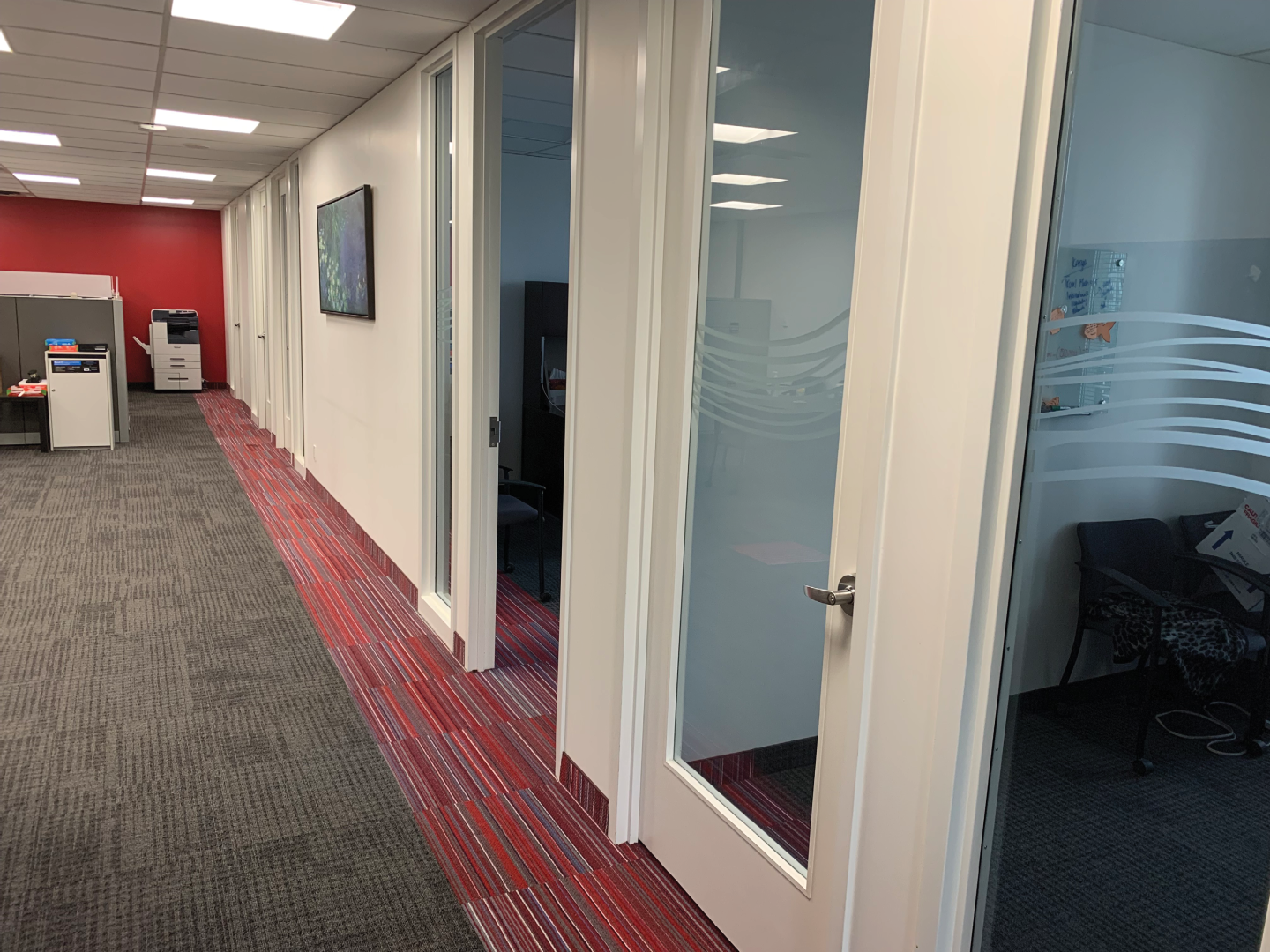 12423 Islington office hallway with multiple glass doors