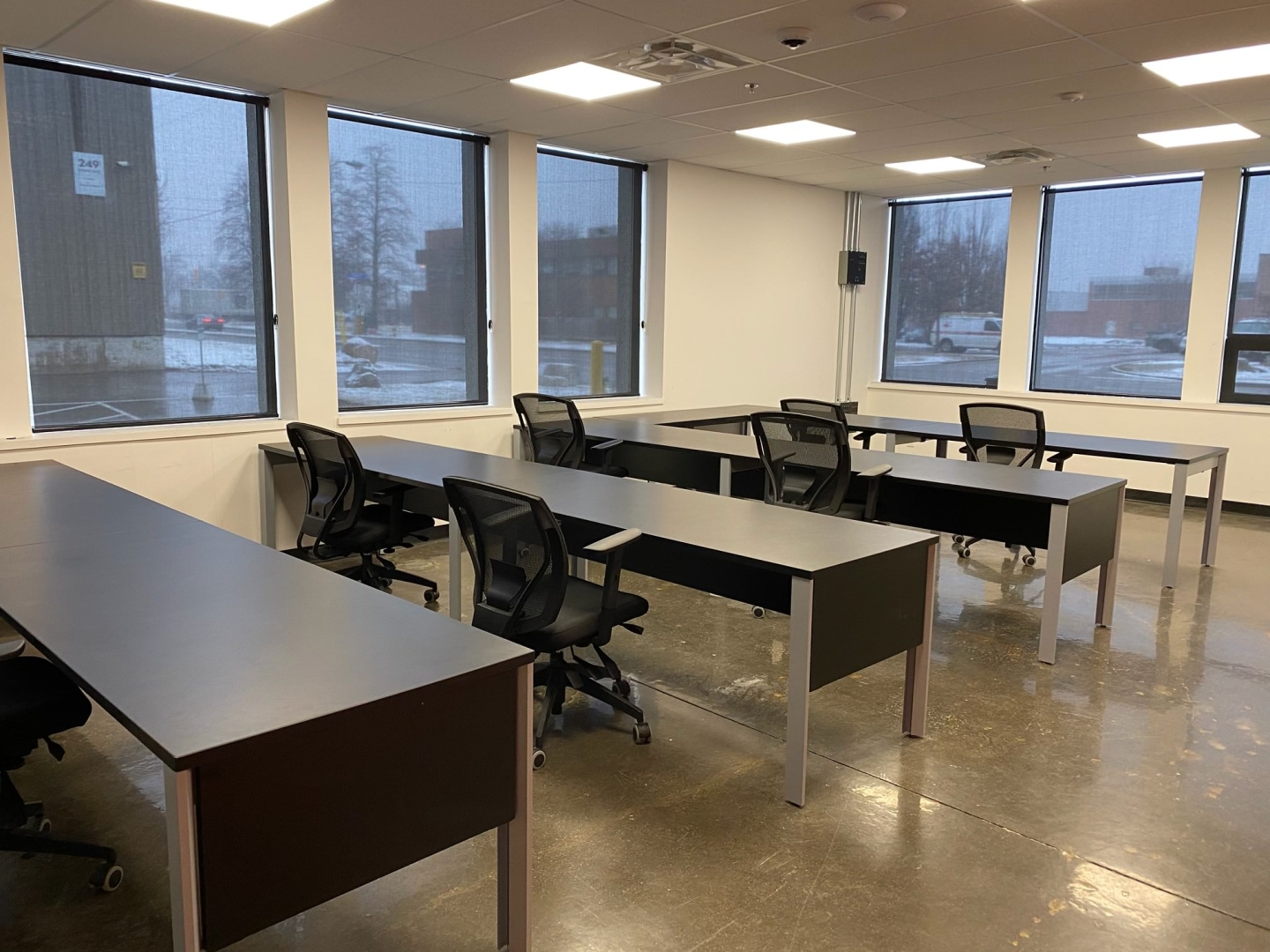 36 Horner Ave interior view of office with desks, chairs and big windows