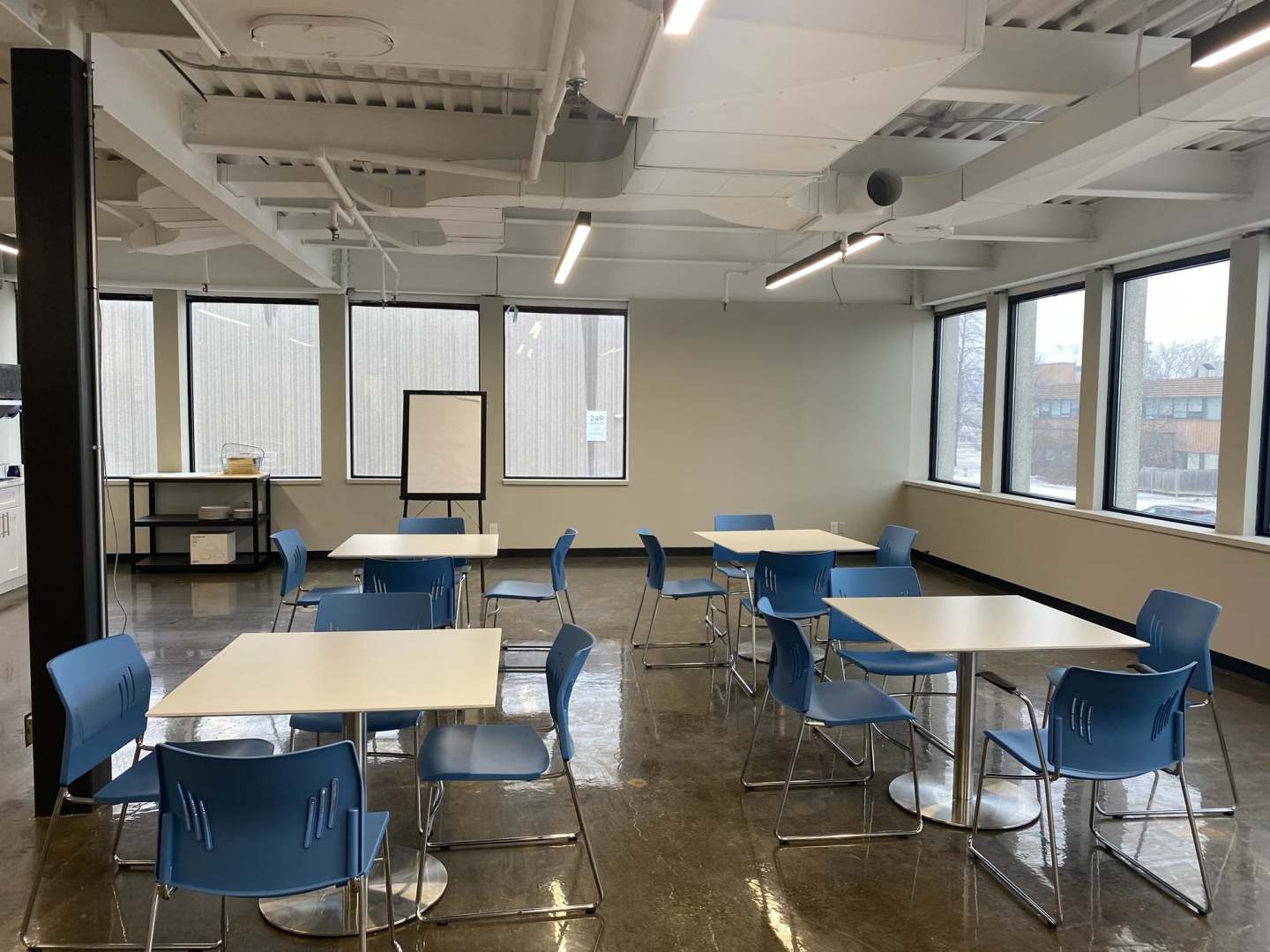 36 Horner Ave office with white desks and blue chairs