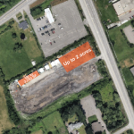 Arial view of land and bays available for lease at 4084 Albion Road