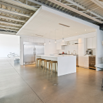 2 Primrose Avenue Interior showing kitchen area with a fridge